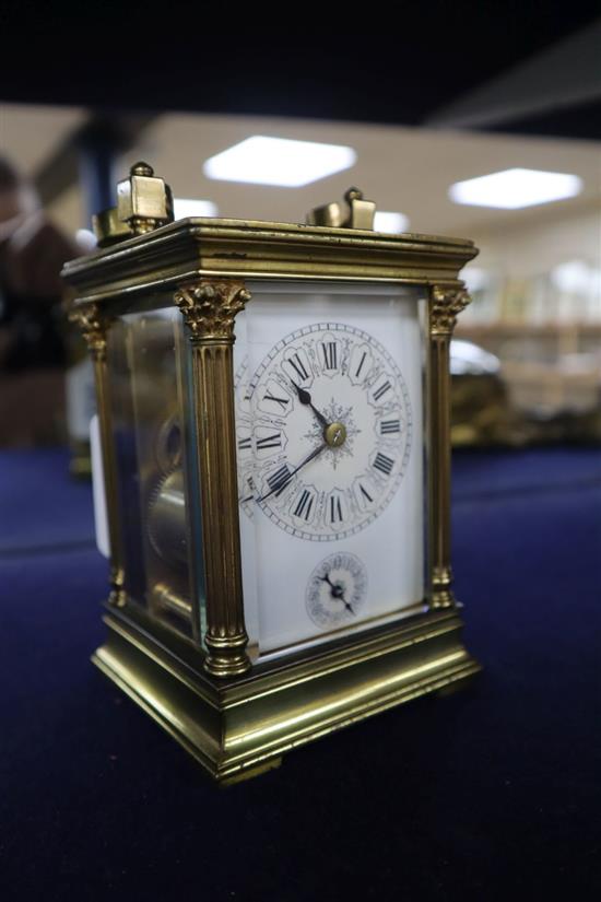 A French corinthian pattern gilt brass carriage clock with alarm, c.1900, height with handle up 16.3cm